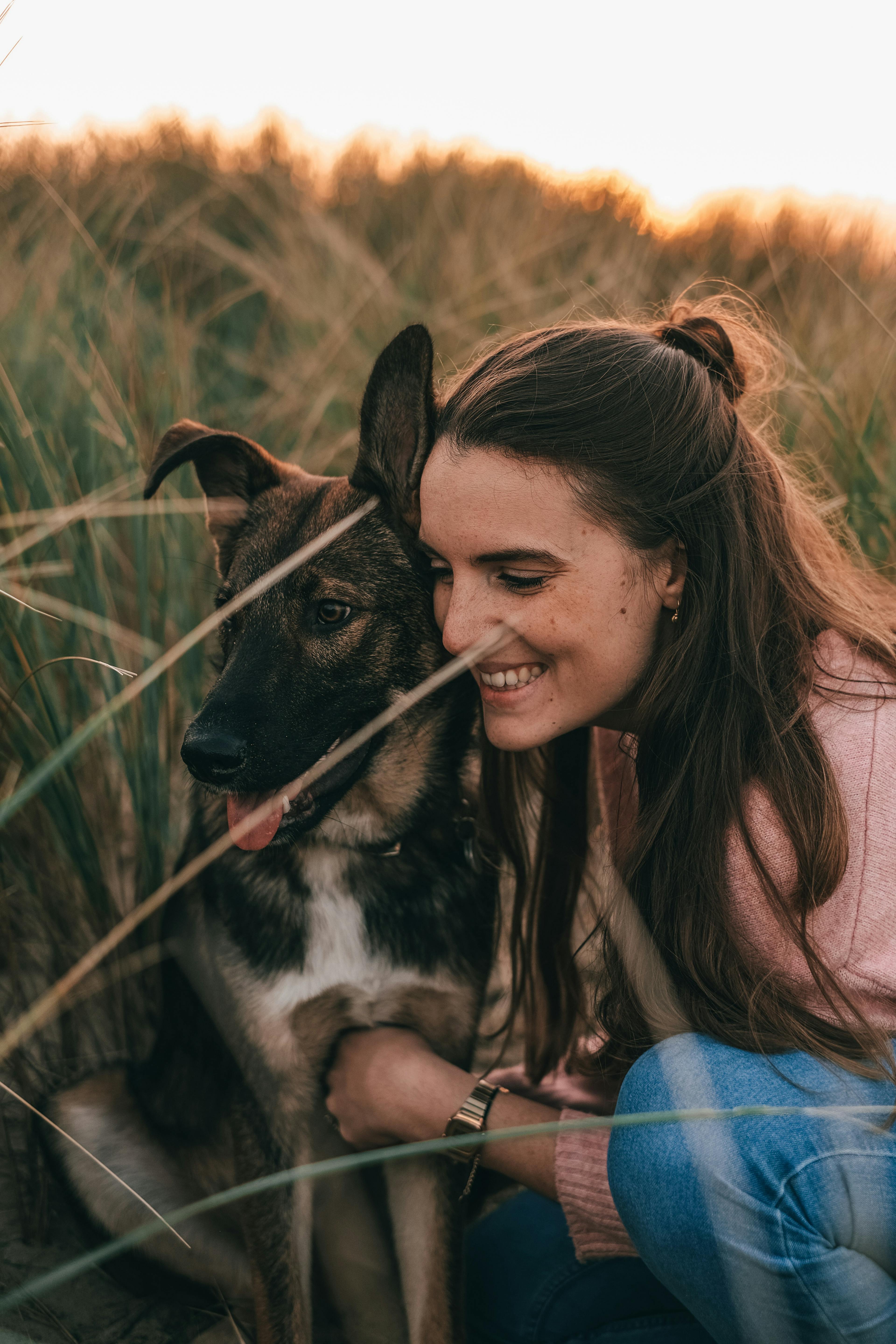 Woman being happy with her dog.